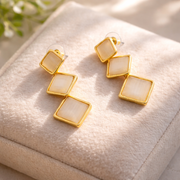 Ivory Glow Geometric Drop Earrings