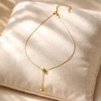 Golden Orb Lariat Necklaces