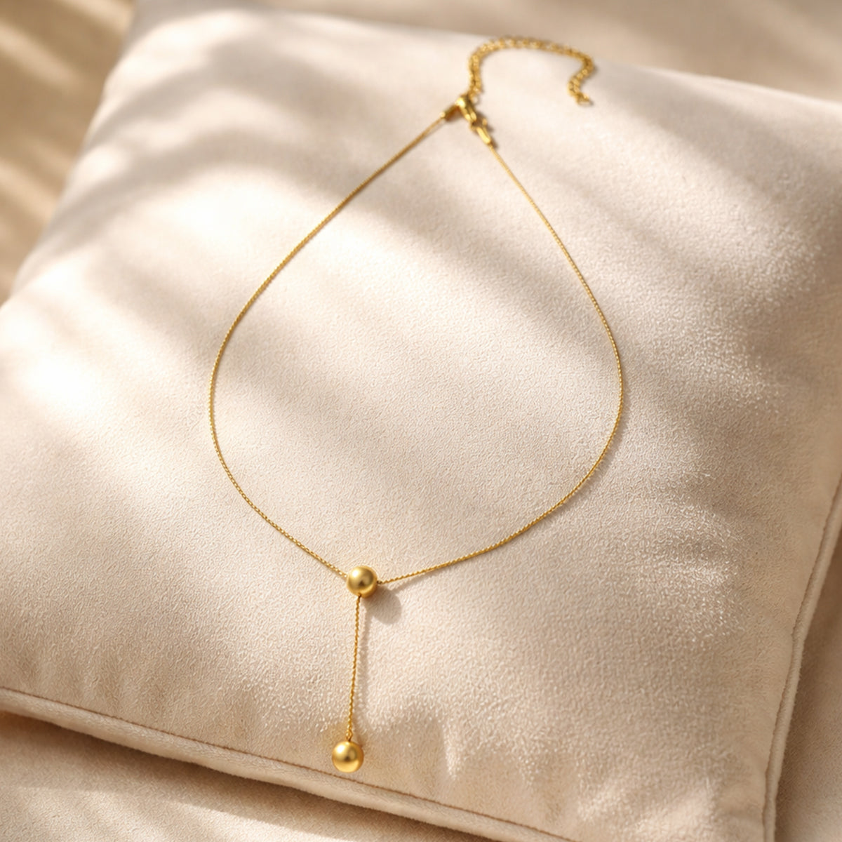 Golden Orb Lariat Necklaces