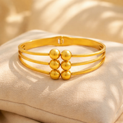 Golden Orbit Ball Bangle