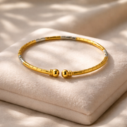 Regal Ripple Gold Statement Bangle