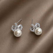 Pearl And Bow Studs