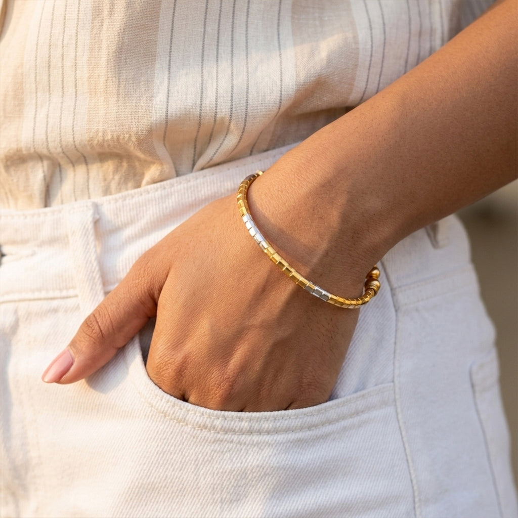 Regal Ripple Gold Statement Bangle
