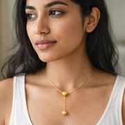 Golden Orb Lariat Necklaces